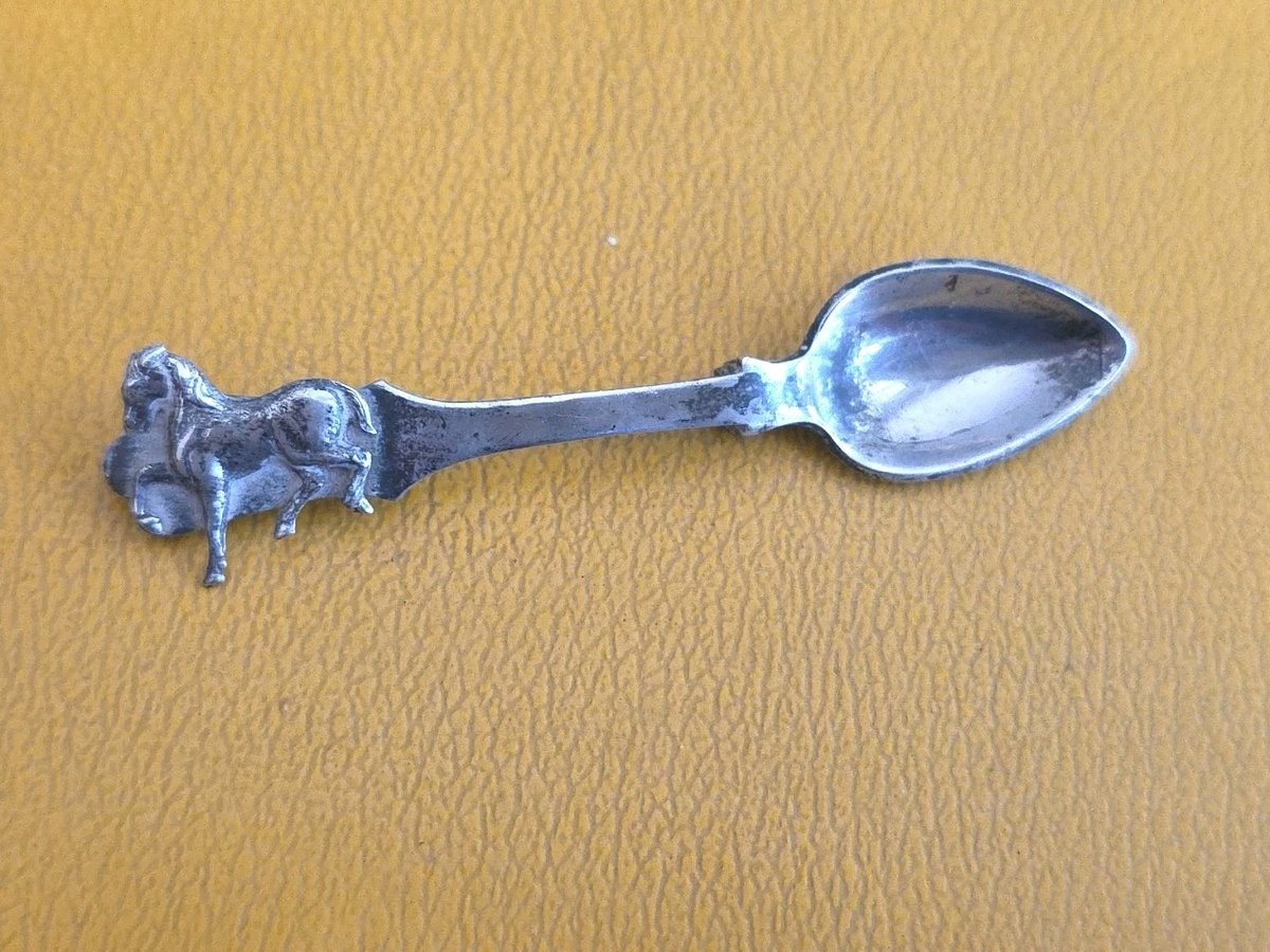 VTG STERLING SPOON AND JOCKEY RIDING HORSE BROOCH.