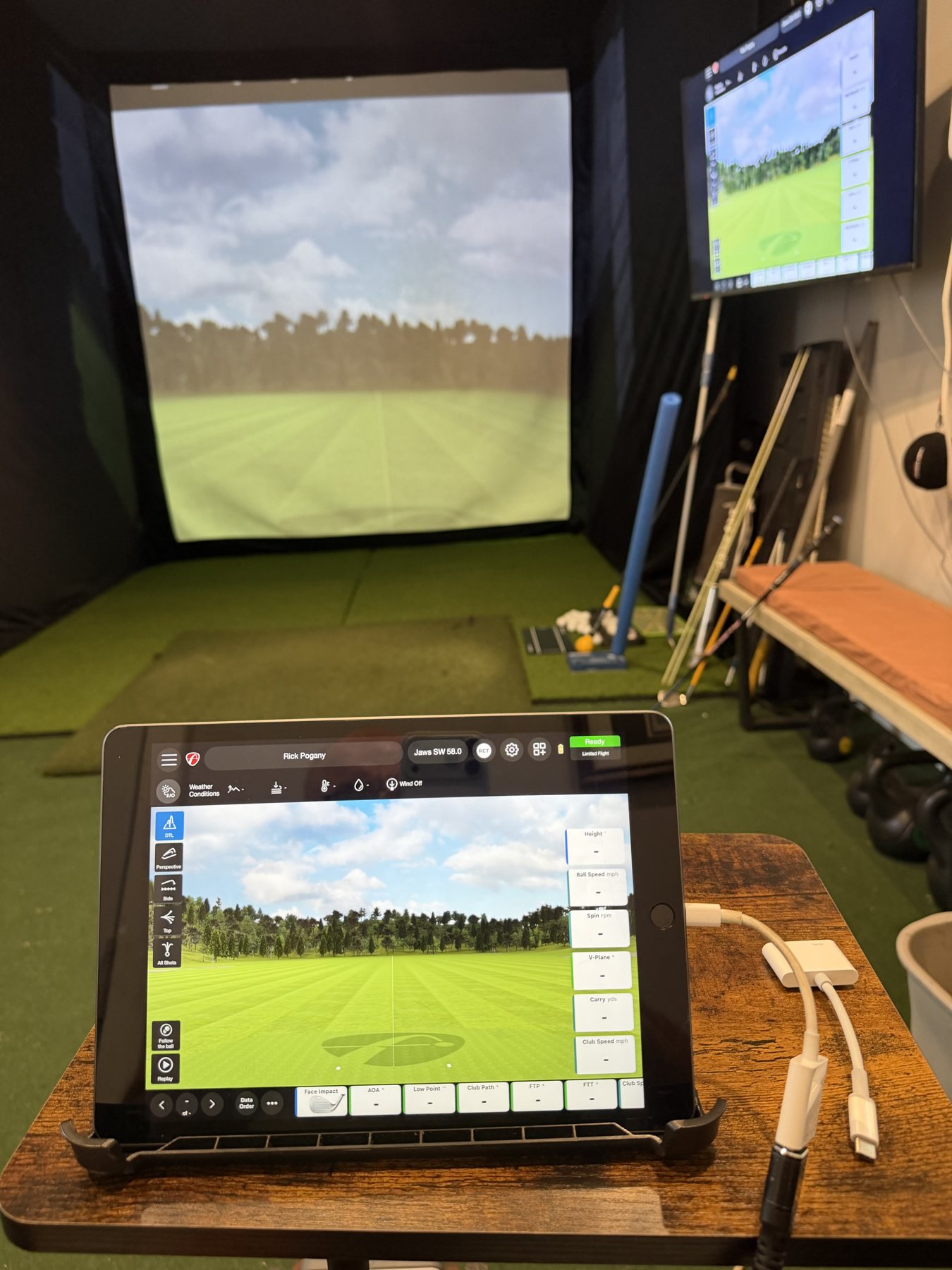 Rick’s studio hitting bay and FlightScope tablet