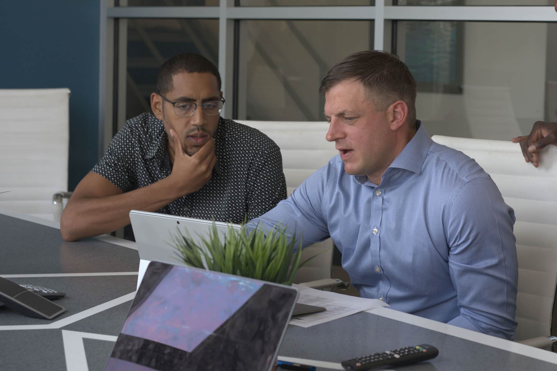 Energy advisors collaborating in an office