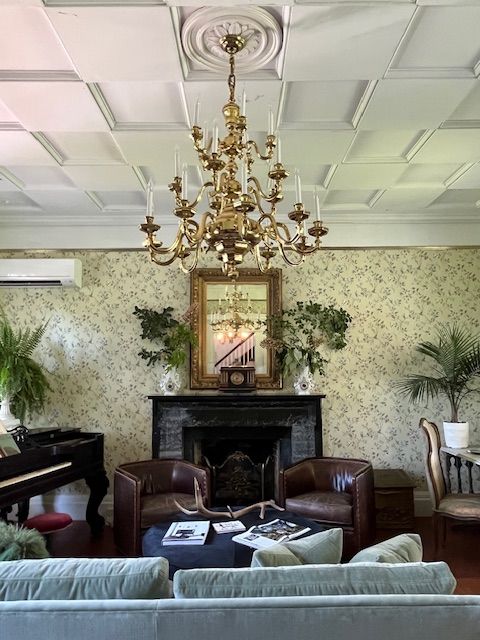 A sitting room with antique furnishings
