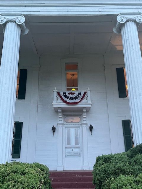 The entrance decorated with bunting