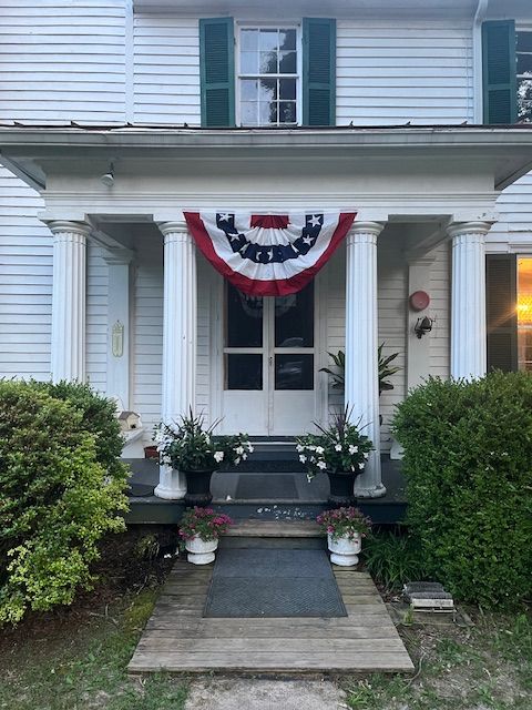 The front doors and porch steps