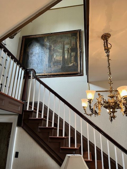 The historic staircase and front door
