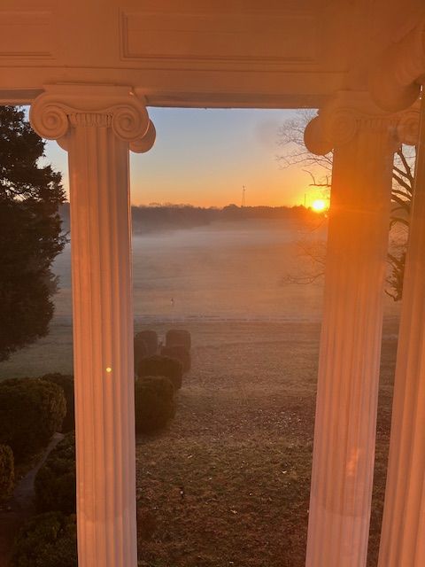 Sunset framed by a window