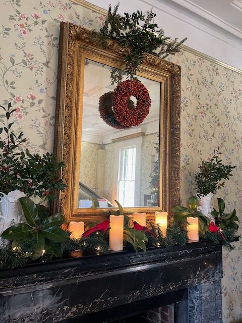 Christmas decorations beside the fireplace