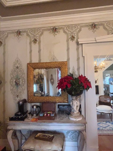 An antique dressing table and mirror