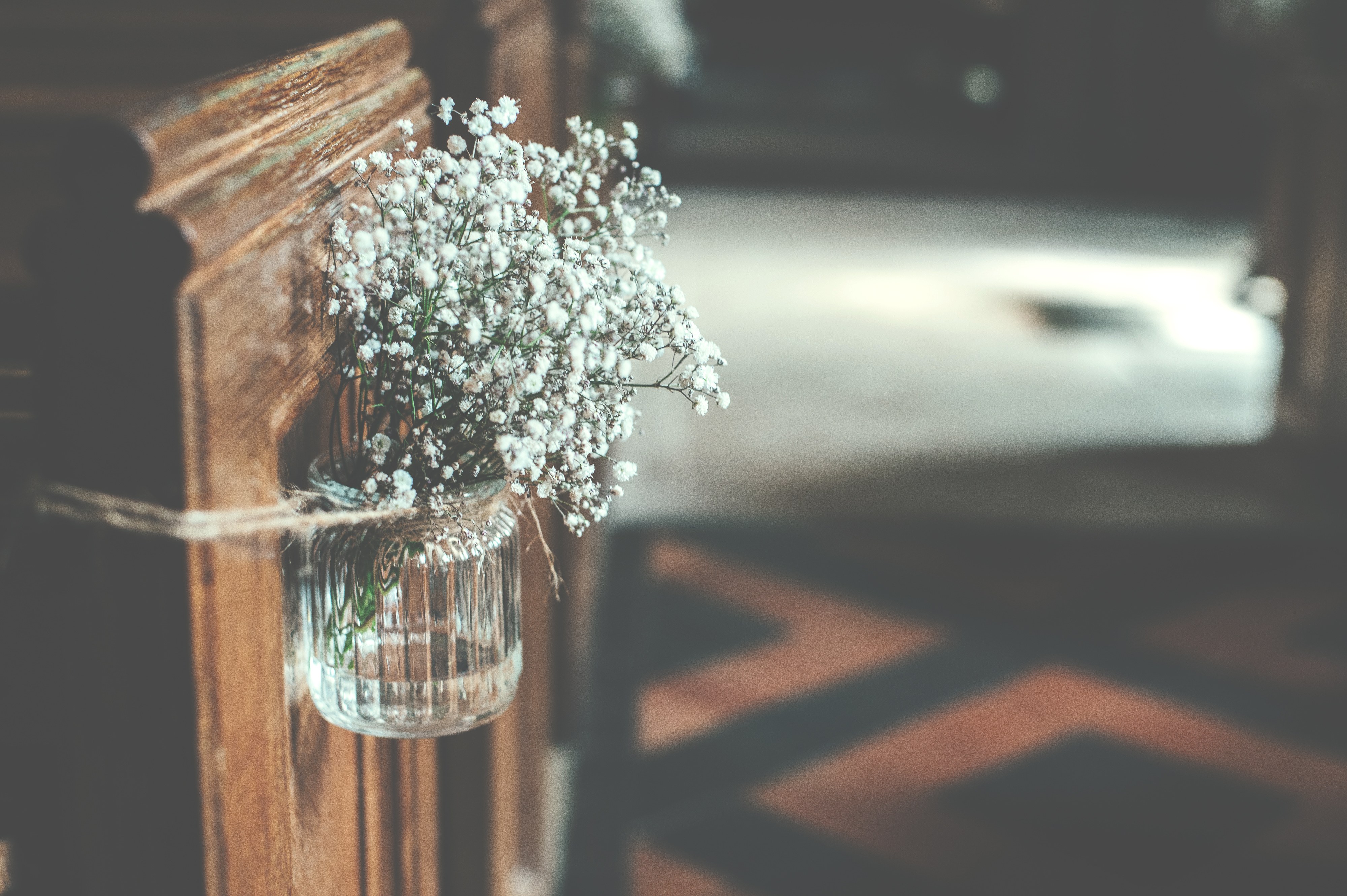Flowers decorating a ceremony chair