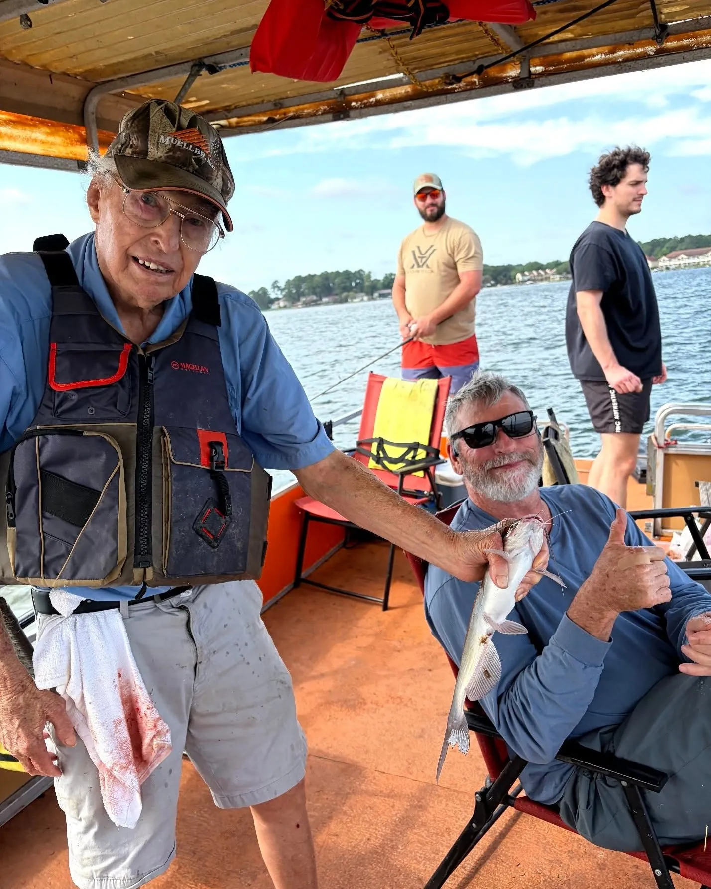 Billy Mills and guests holding up fish during a Lake Conroe trip. Lake Conroe Fishing Guide - Billy Mills