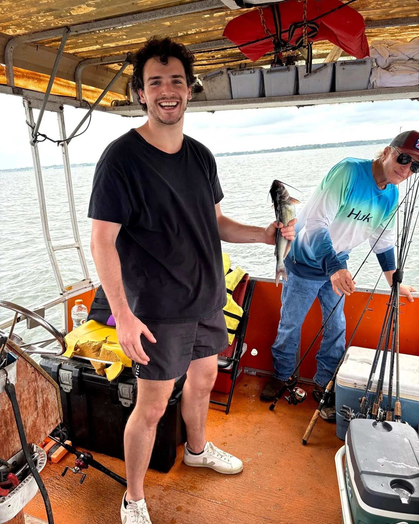 Guest and Billy Mills holding a fish on a Lake Conroe trip. Lake Conroe Fishing Guide - Billy Mills