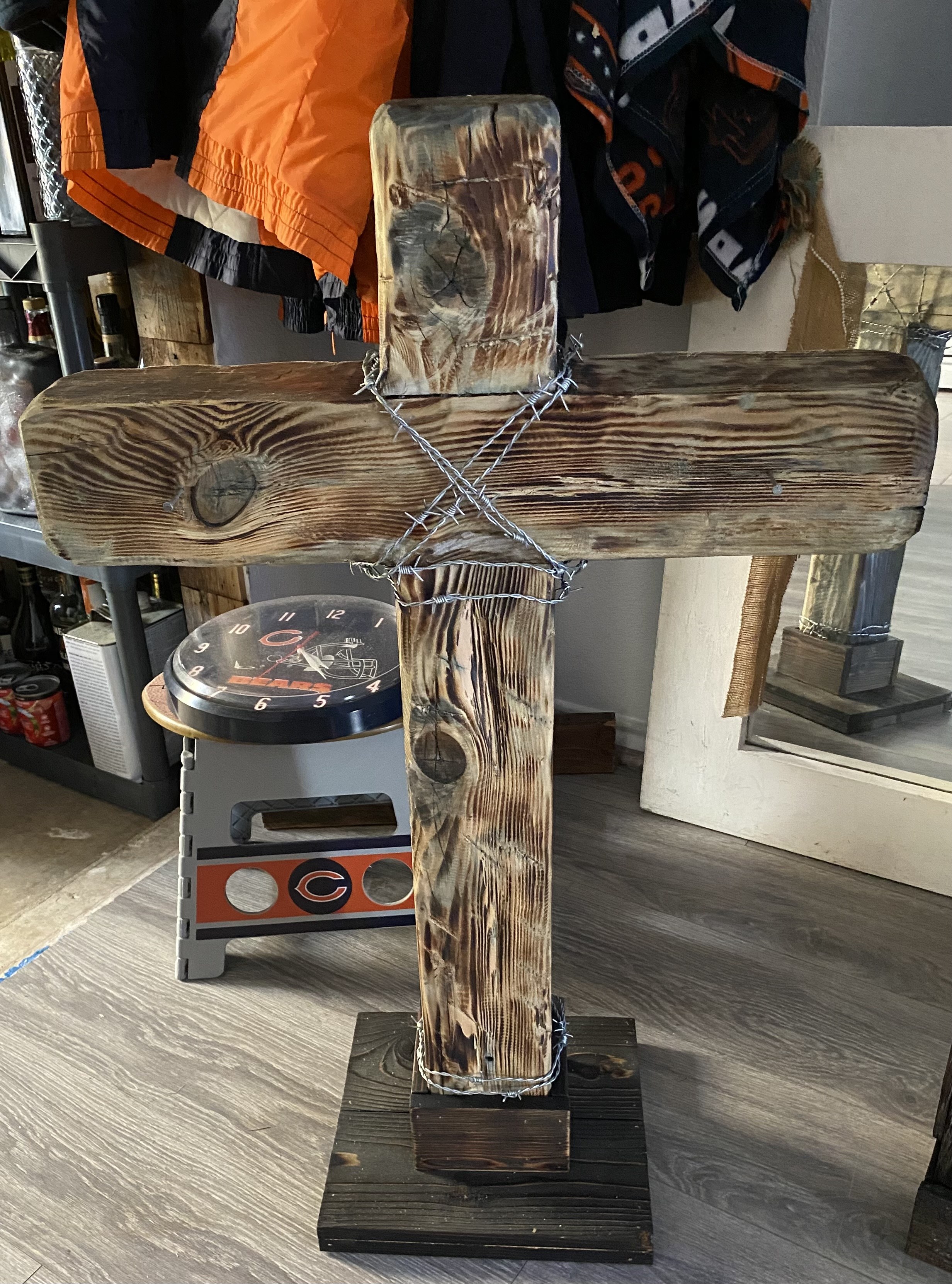 Handmade wooden cross with barbed wire detail