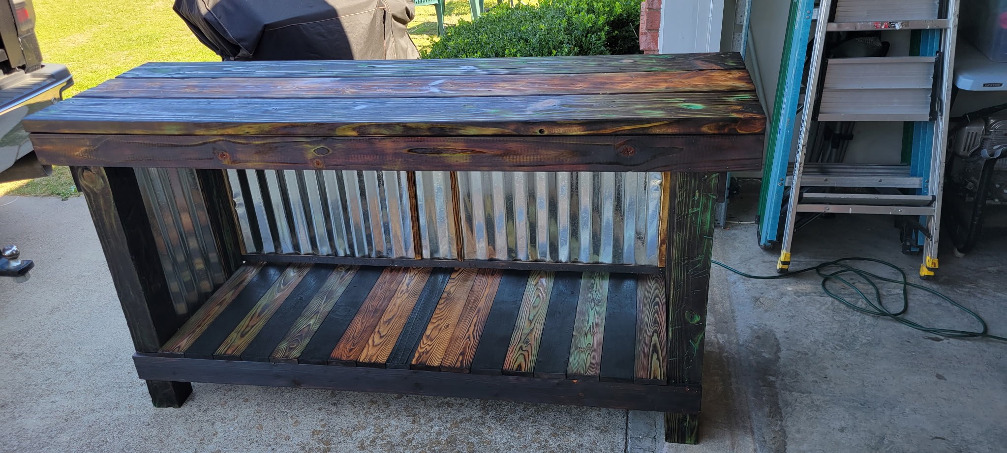 Handmade reclaimed wood console table with colorful lower shelf
