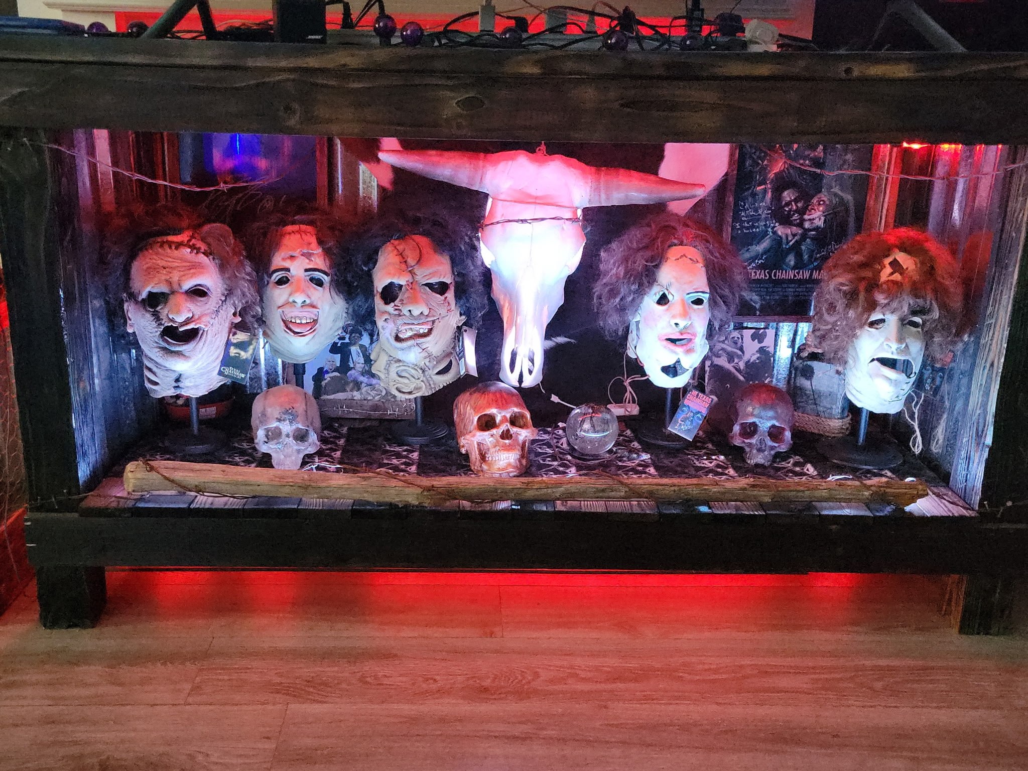 Red-lit custom wood display cabinet