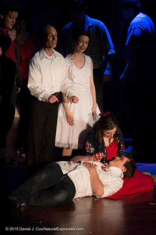 Maria falls to the floor to help tony who has been shot. 1/100th. of a second at ISO 2000 