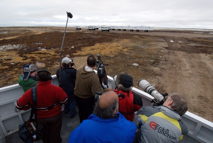 An NBC TV crew doing a story on polar bears. David Vaskevitch in the red and black jacket on the right with the big furry hat getting still photos.