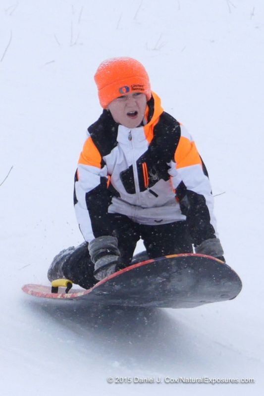 Isabella and Isak sledding on Pete's Hill. Bozeman, Montana