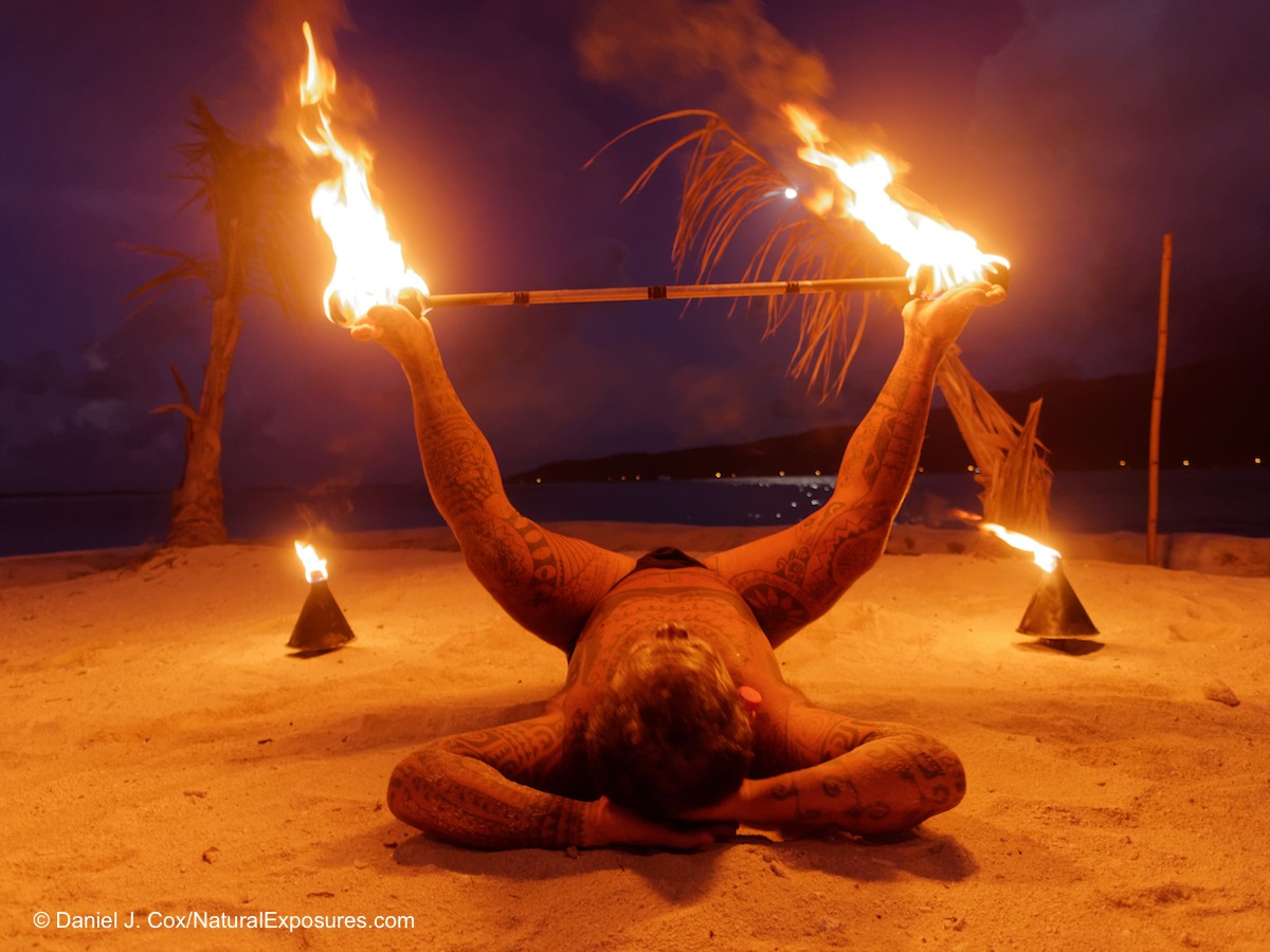 Tahitian fire dancer performing on the island of Bora Bora, Tahiti Lumix GX8 with Olympus 12mm F/2.0 lens ISO 1600