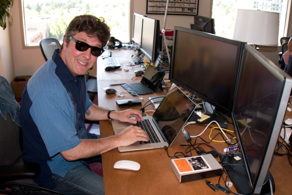 Captain Cool, Mylio software engineering guru JP Duplessis working his Mylio magic on his Mac keyboard. Mylio headquarters in Seattle, Washington.