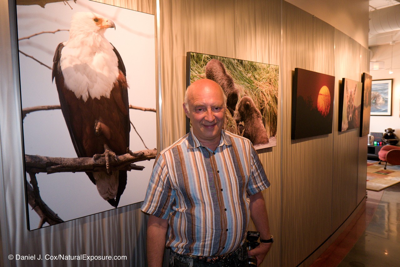 David Vaskevitch, CEO of Mylio in front of a wall of his photography at Mylio headquarters in Seattle, Washington.