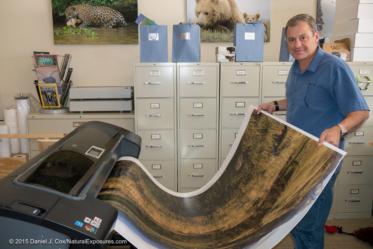Dan taking a large 40x60 inch print off the HP Z3200 printer.