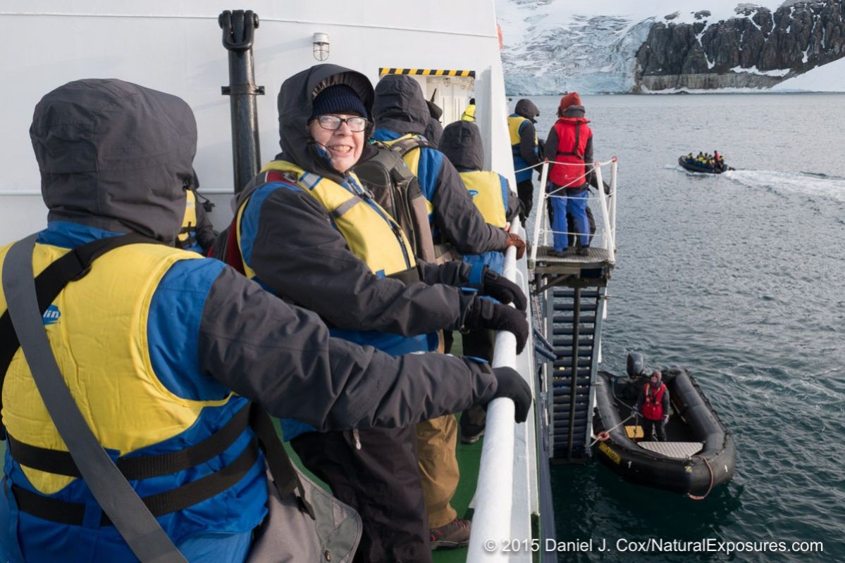 Linda waits for her to board the Zodiac to take her to the cliffs of Alkefjellet, Svalbard, Norway. Lumix GH4 with 12-23mm F/2.8