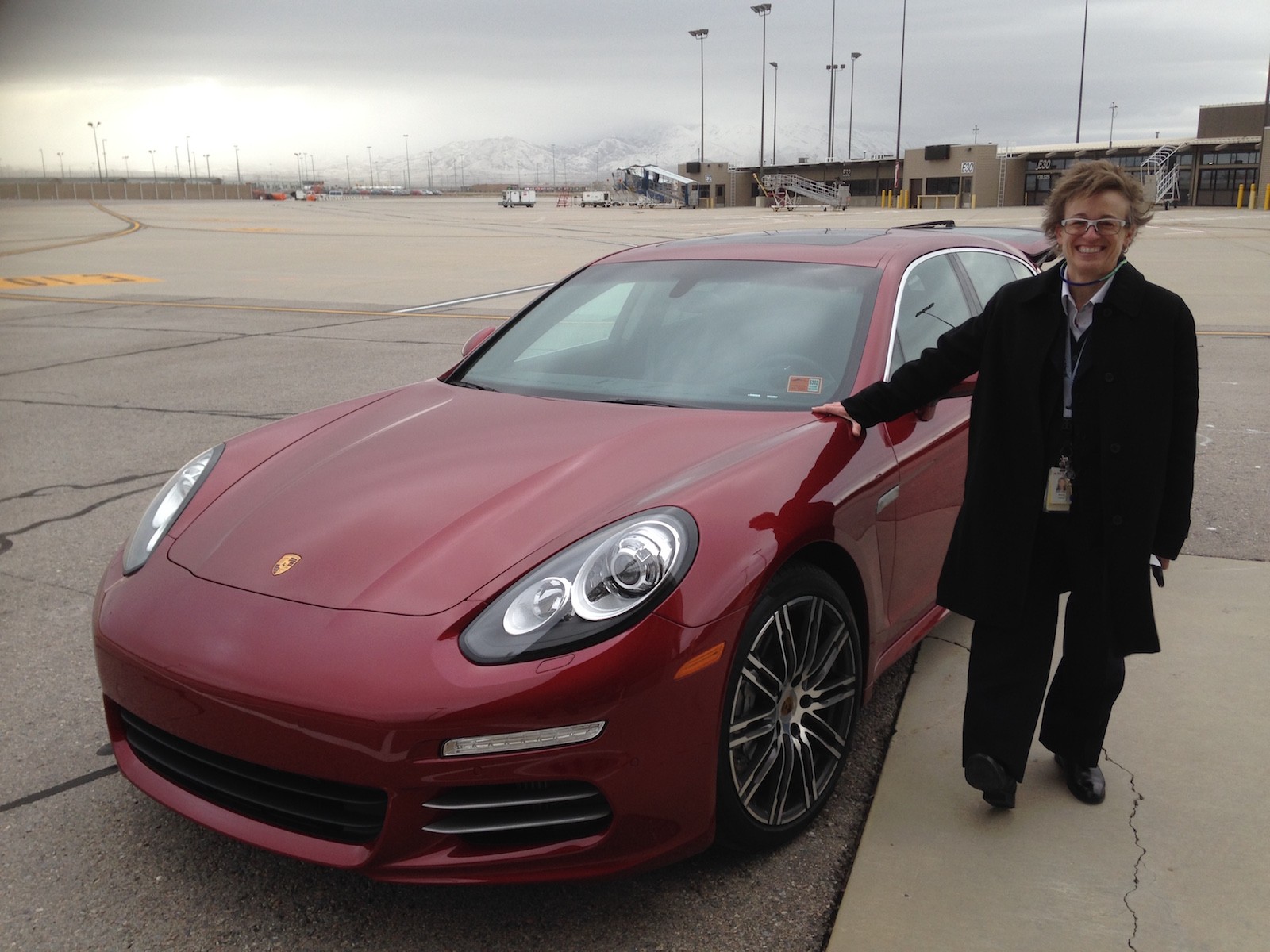 Here's my proof I want' dreaming. Delta chauffeur Deborah Pratt stands beside one of the most beautiful cars I've ever ridden in, a gorgeous Porsche.