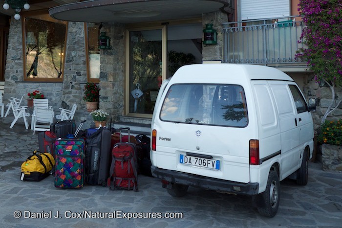 Our bags wait to be stuffed in to the oversized wheel barrow on four wheels for their ride down the mountain to our waiting bus. GH4 with 12-35mm F/2.8