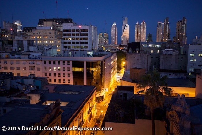 The city of Buenos Aires in the blue light of dusk shot from our hotel rooftop. Lumix GH4 with 15mm F/1.7 Lecia Summilux lens. ISO 800