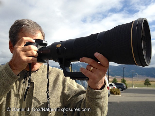 Daniel Cox gets a chance to try the new Nikkor 800mm F/5.6 that Nikon Rose Whitaker brought to the Bozeman Camera Photo Expo in Bozeman, Montana