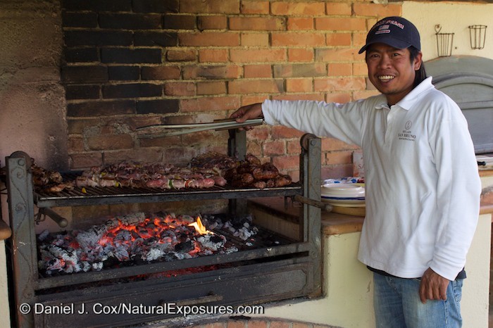 One of the friendly employees at Relais San Bruno fixes a delicious barbecue for our first nights dinner. Lumix GH4 with 12-35mm F/2.8