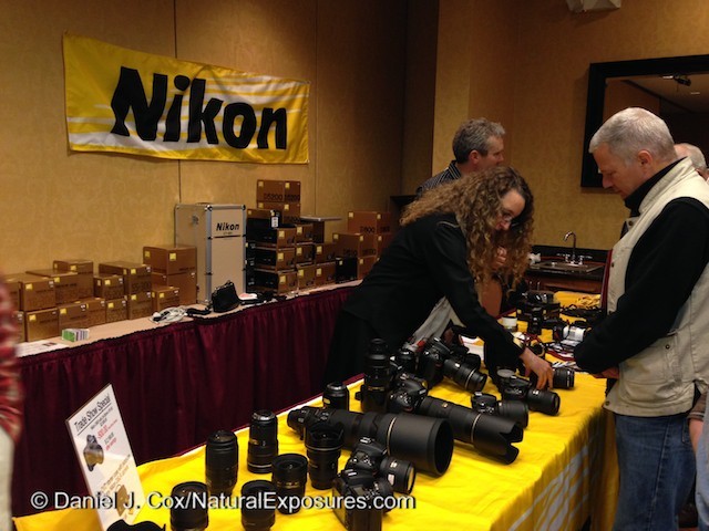 Nikon's Rose Whitaker discusses the Nikon system with folks attending the Photo Expo in Bozeman Montana.