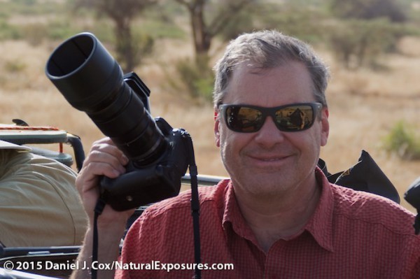Daniel Cox holding the Lumix GH4 with Olympus 40-150mm F/2.8 lens. Photo by Tanya Cox. Lumix FZ1000 125ISO