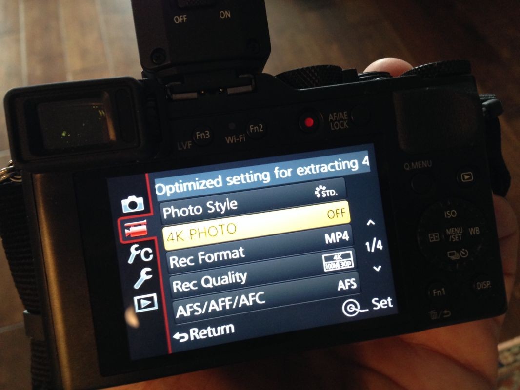 4K Photo Mode is found in the Video tab second option down on the first page of settings. 