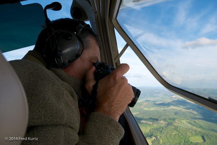 Dan shooting aerials from a Cesna 172, the Lumix GH4 with the 12-35mm F/2.8 lens over the Tuscany countryside. Italy