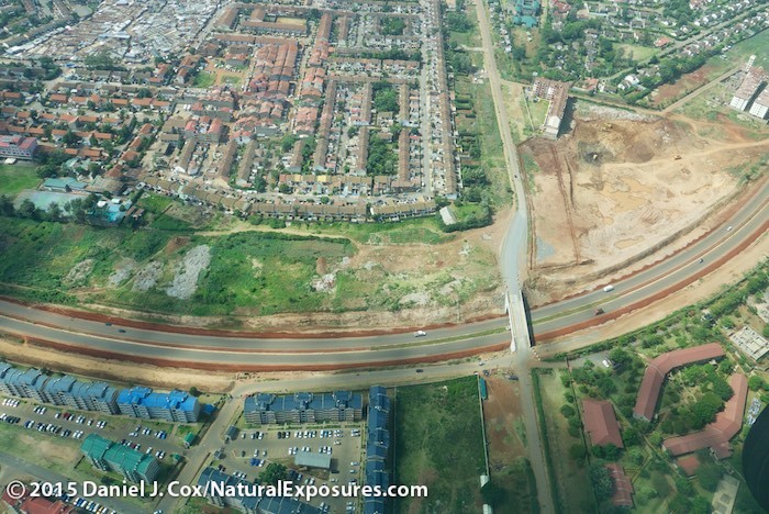 Flying over the suburbs of Nairobi you can see one of the newly paved highways. Lumix LX100, ISO 320