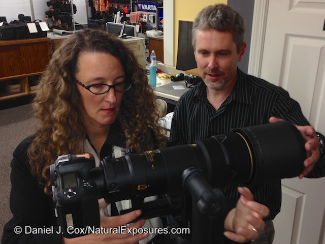 Marshal Lewis of Bozeman Camera and Rose Whitaker discuss the Nikkor 200-400mm lens at Bozeman Camera, Montana
