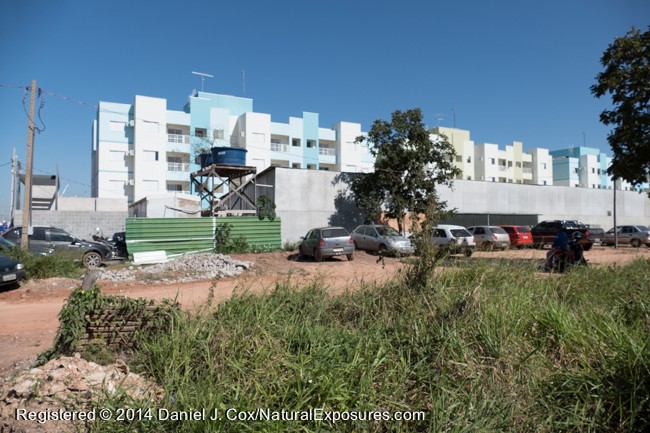 Apartment buildings being built on the edge of a private black-tailed marmoset reserve in Cuiaba, Brazil