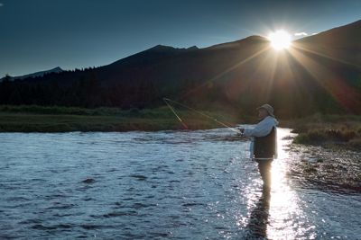 Fishing for salmon on Silver Salmon Creeek in Lake Clark National Park, Alaska.