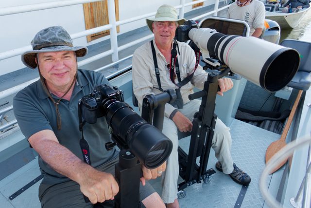 Two NE Explorers with cameras aboard a boat