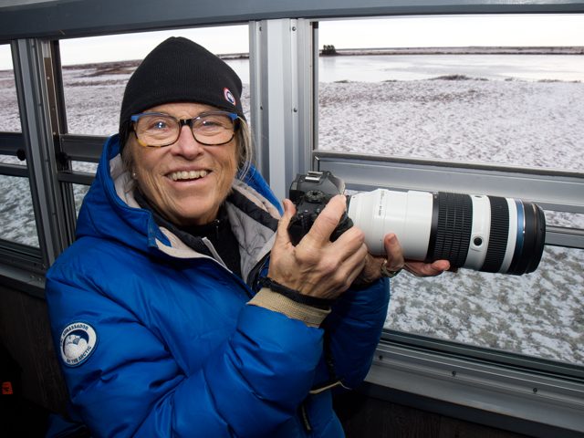 NE Explorer with a telephoto camera inside a vehicle