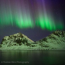 Lofoten Islands winter landscape beneath the northern lights